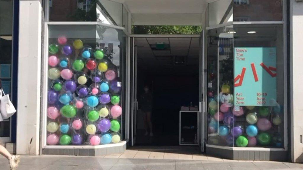 A shop front in Exeter, filled with an art installation