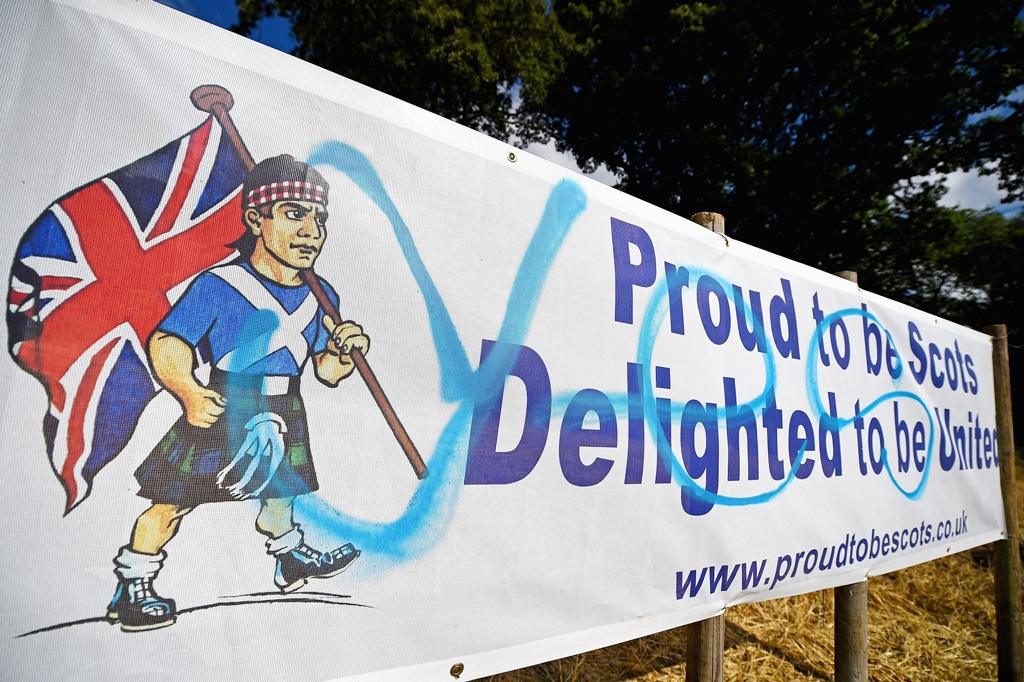 Better Together "No" campaign banners spray painted with "Yes" graffiti in August 2014 near Dundee