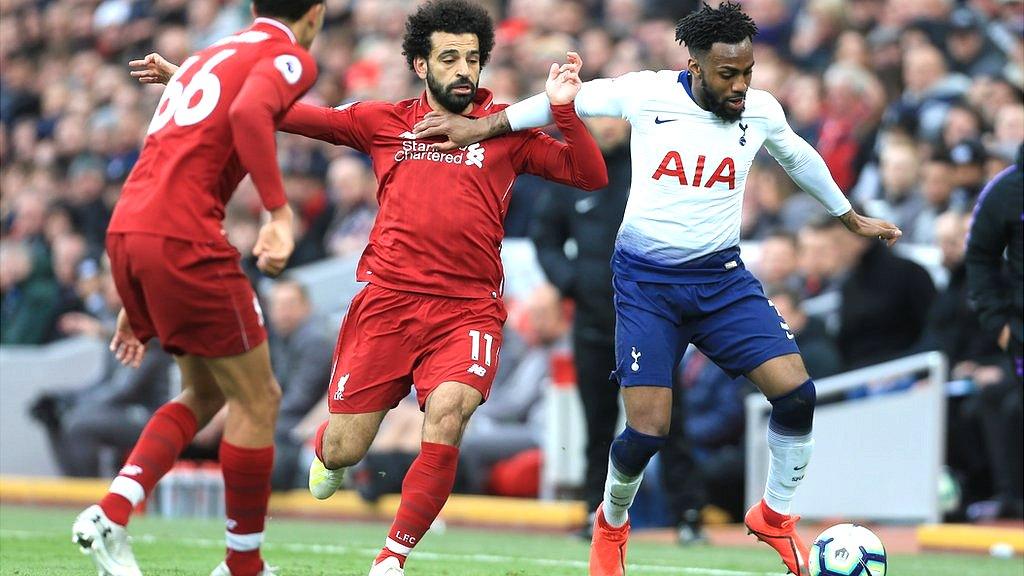 Danny Rose of Spurs tussles with Mo Salah of Liverpool