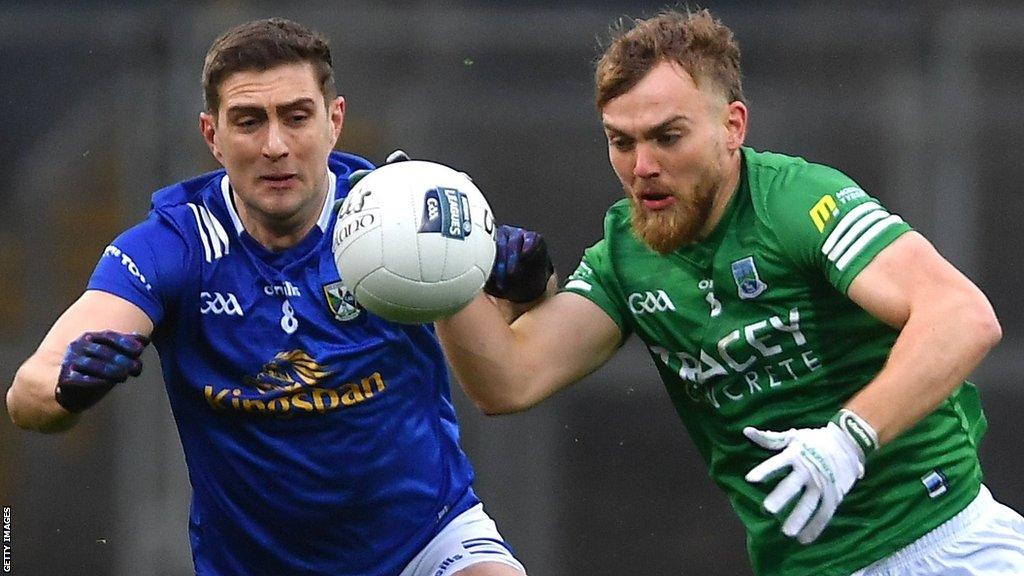 Fermanagh's Ultan Kelm attempts to burst away from Cavan's Killian Clarke at Croke Park