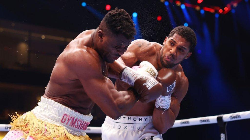 Anthony Joshua lands a right hook against Francis Ngannou