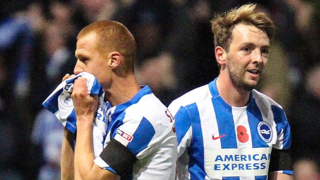 Steve Sidwell kisses Anthony Knockaert's shirt