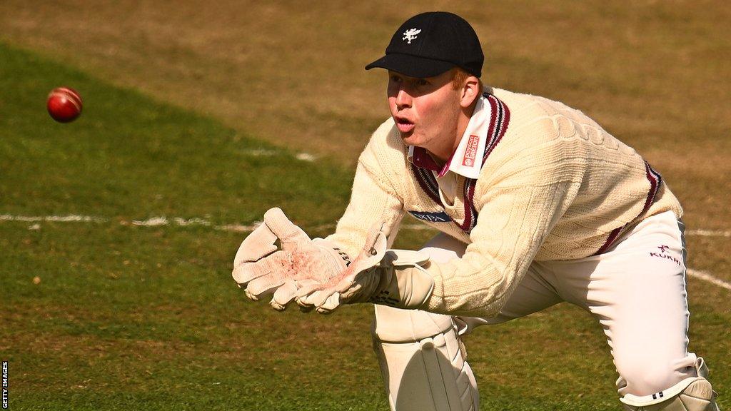 Somerset wicketkeeper James Rew goes to catch the ball