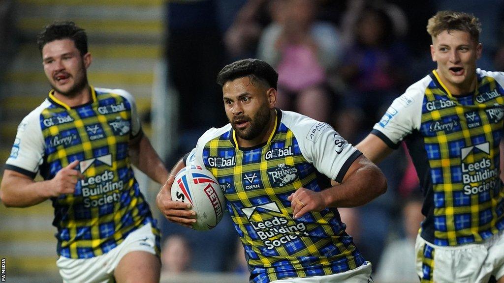 Rhyse Martin (centre) scored 26 of Leeds Rhinos' 54 points against Huddersfield Giants