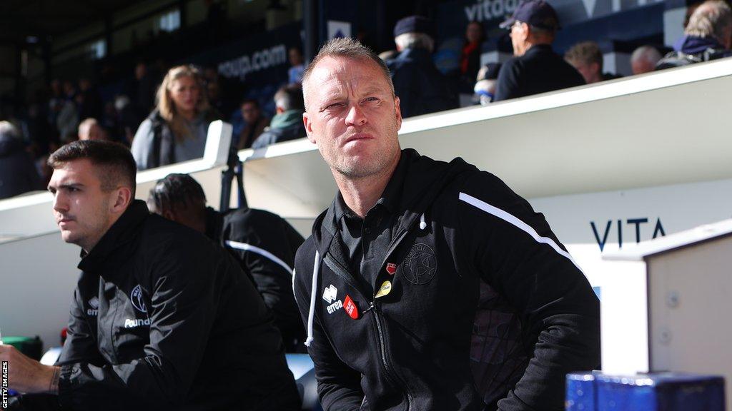 Michael Flynn in the dugout for Walsall