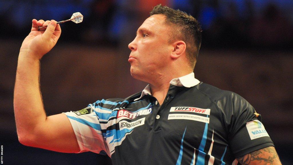 Gerwyn Price throws a dart