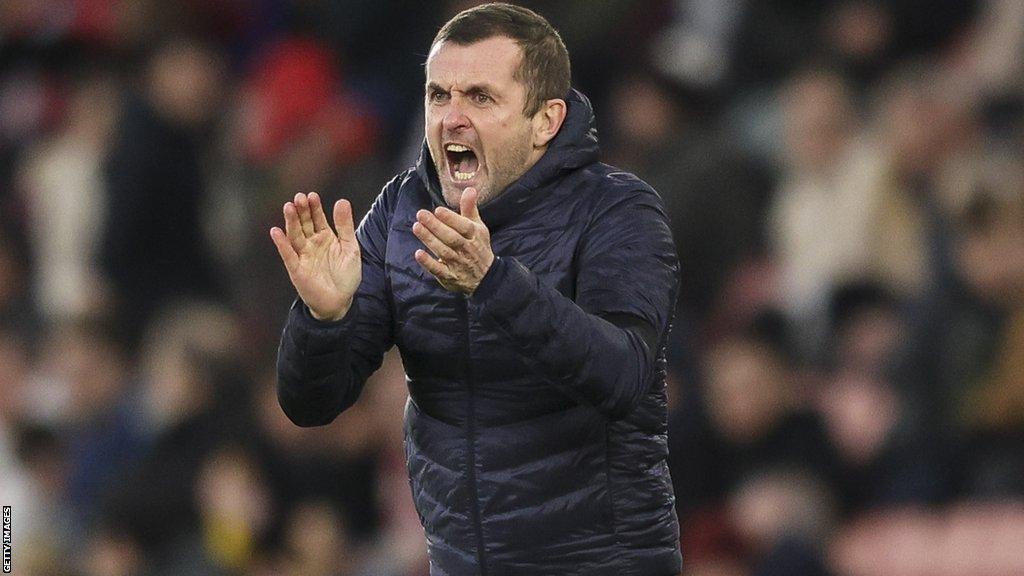 Nathan Jones encourages his players while managing Southampton