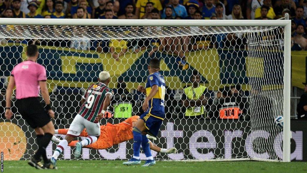 John Kennedy scores deep in extra time