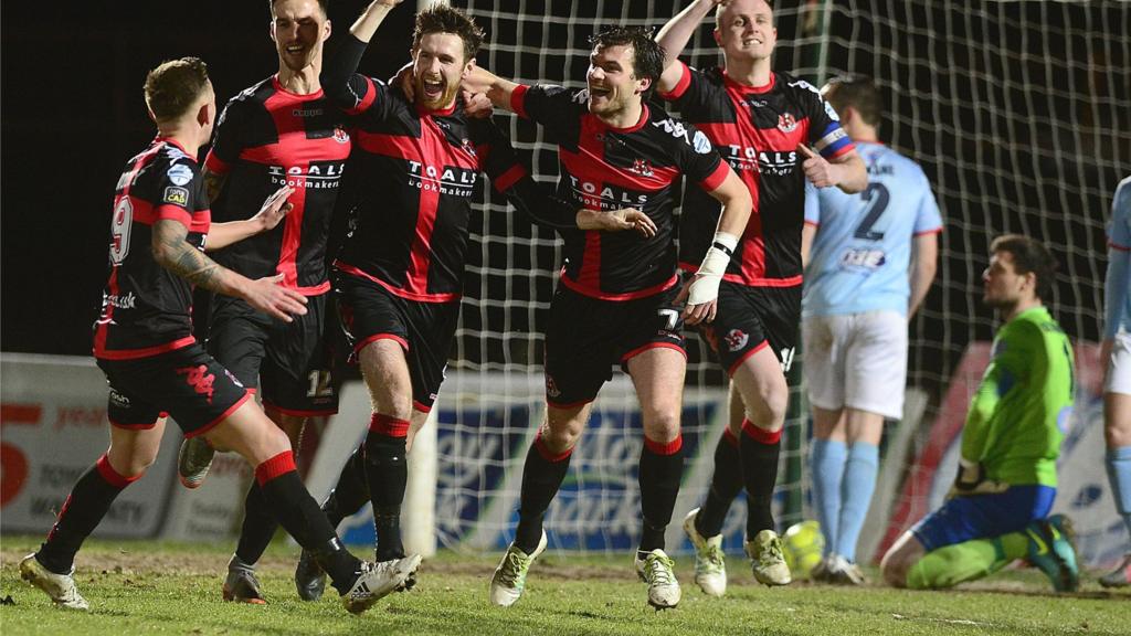 Action from Ballymena United against Crusaders