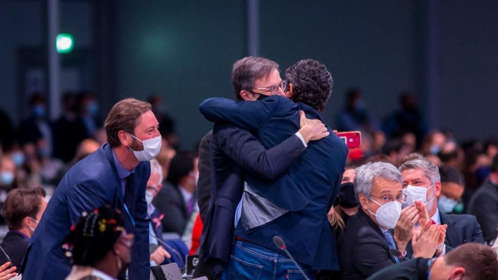 7 Delegates celebrate the success of the event during the Plenary session of the COP26 UN Climate Change Conference in Glasgow, Britain, 13 November 2021.