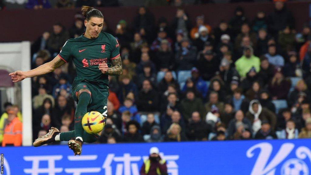 Darwin Nunez takes a shot against Aston Villa