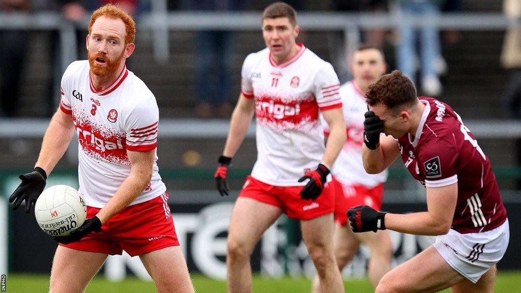 Conor Glass is about to pass to a Derry team-mate at Salthill