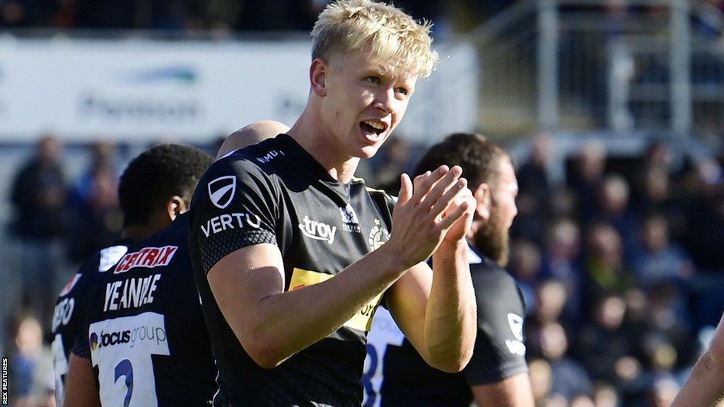 Josh Hodge celebrates a try