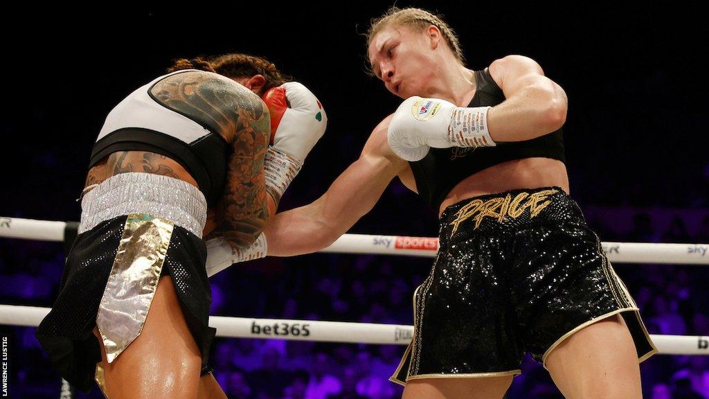 Silvia Borto (left) takes a punch from Lauren Price (right)