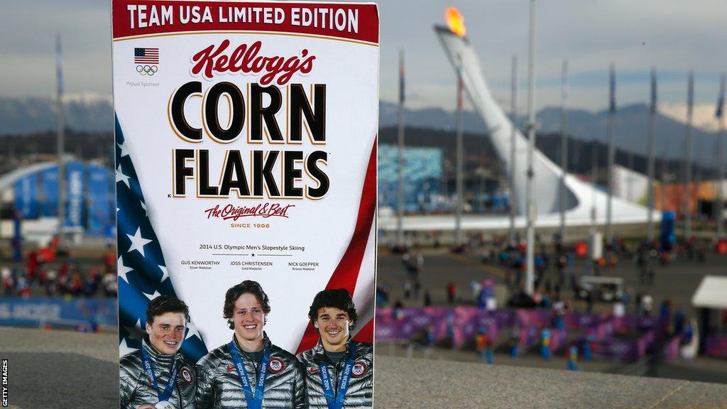 A box of Corn Flakes featuring Team USA's men's slopestyle medal winners, including Gus Kenworthy