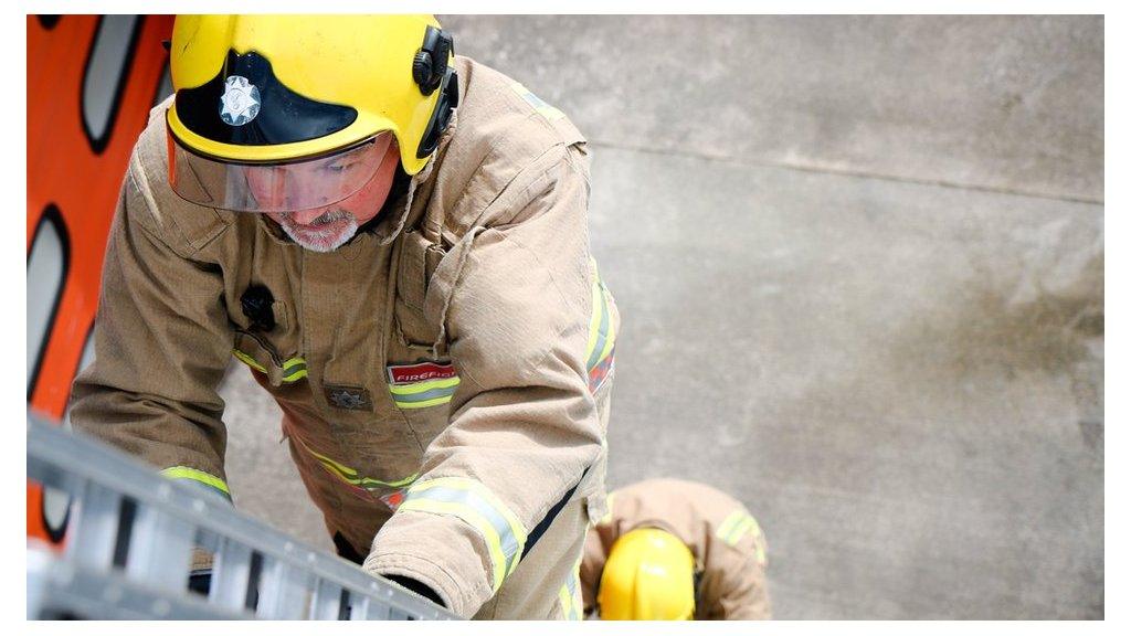 Firefighter on a ladder