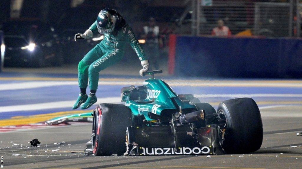 Lance Stroll climbs from crashed Aston Martin
