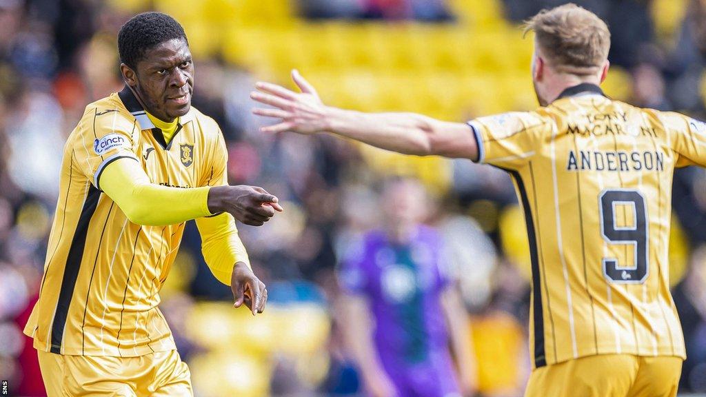 Livingston striker Joel Nouble (left) celebrates