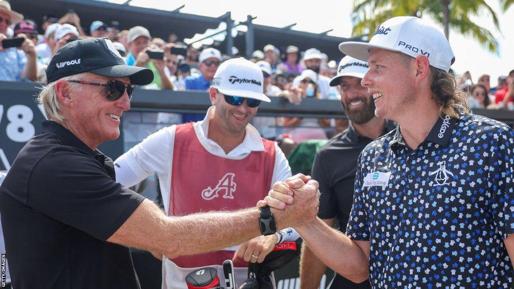 LIV Golf commissioner Greg Norman shakes hands with Australian golfer Cameron Smith at the LIV Golf Invitational in Miami