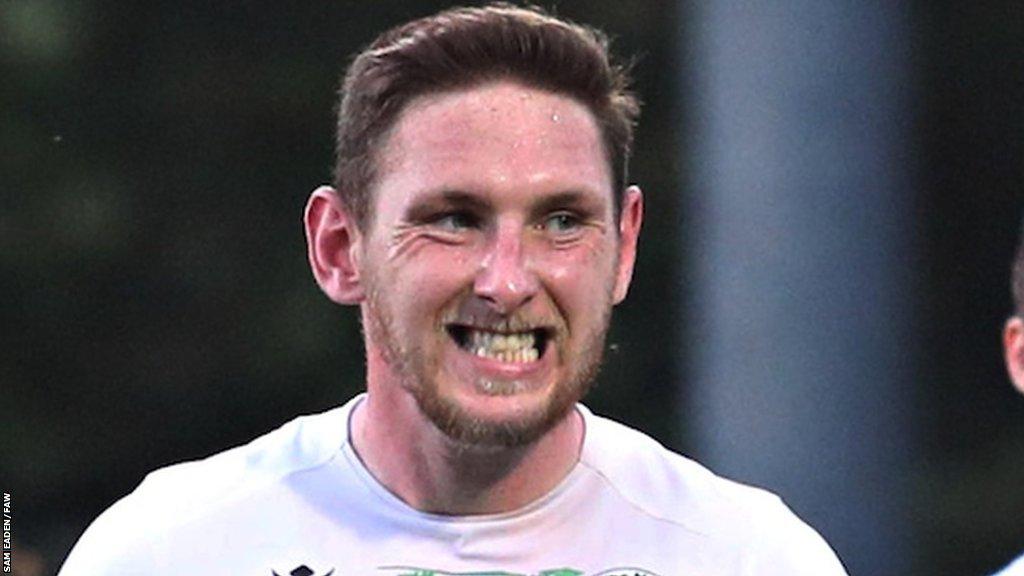 Declan McManus celebrates with TNS