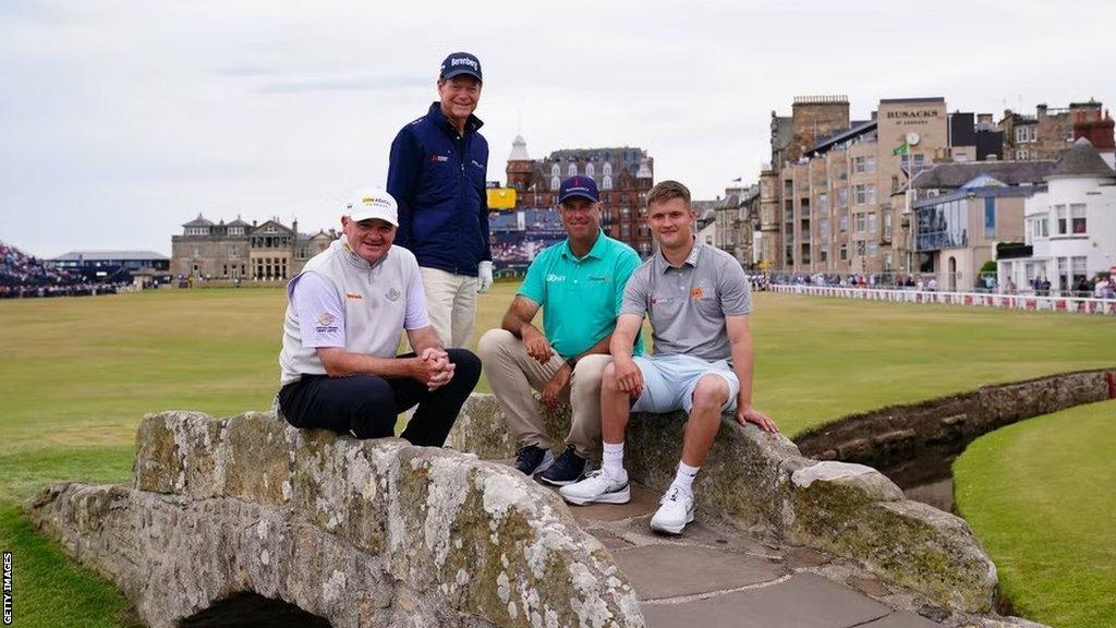 Paul Lawrie, Tom Watson, Stewart Cink and Kipp Popert pose for a photo on the Swilcan Bridge on the 18th hole of the Old Course, St Andrews