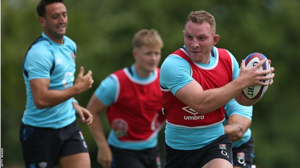 Sam Underhill carries the ball during training