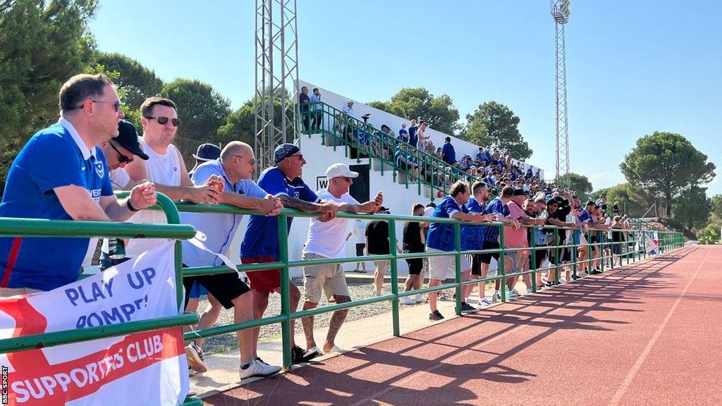 Meet the diehard Portsmouth football fans who've followed their team to an old fishing village in Spain on pre-season training camp.