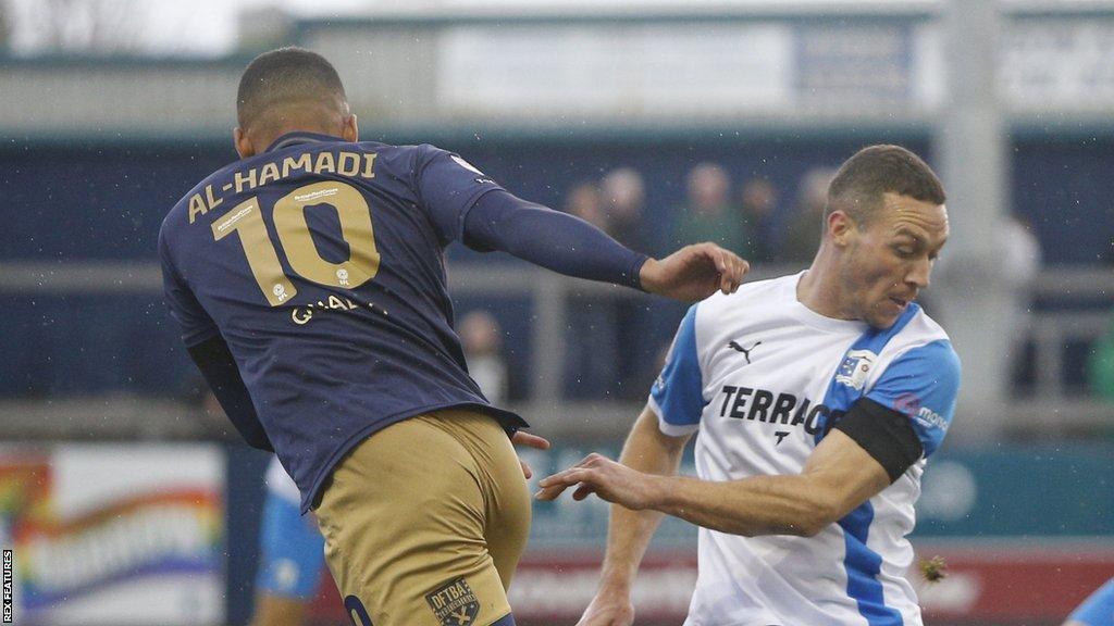 James Chester playing for Barrow