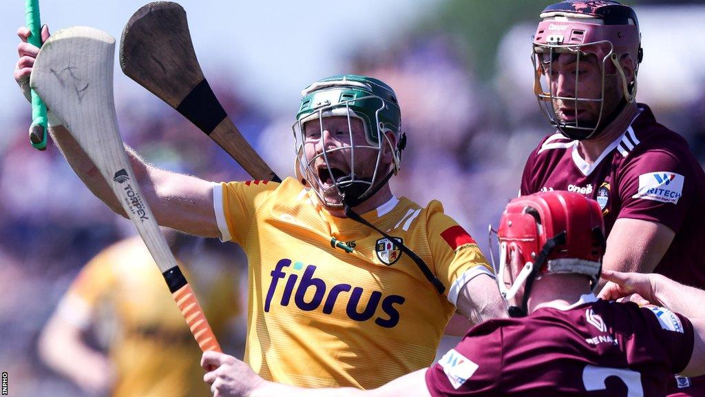 Antrim's Niall McKenna battles with Westmeath's Darragh Egerton