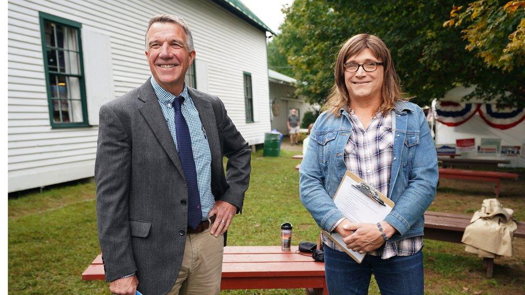 Vermont Governor Phil Scott and his Democratic challenger Christine Hallquist before a debate at a fair