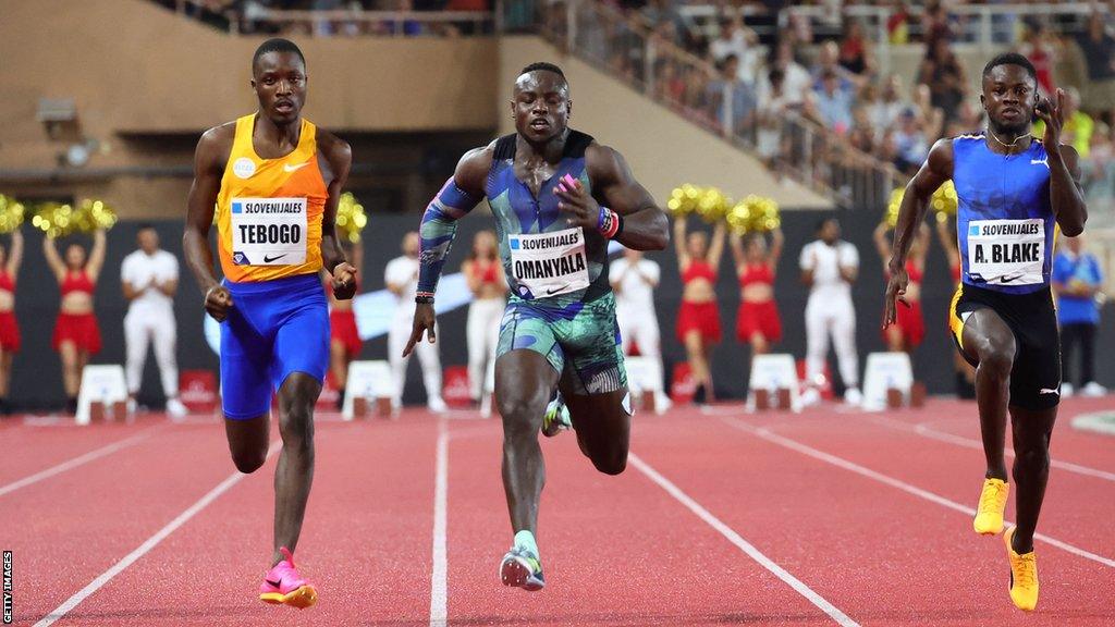 Letsile Tebogo (left), Ferdinand Omanyala (centre) and Ackeem Blake (right)