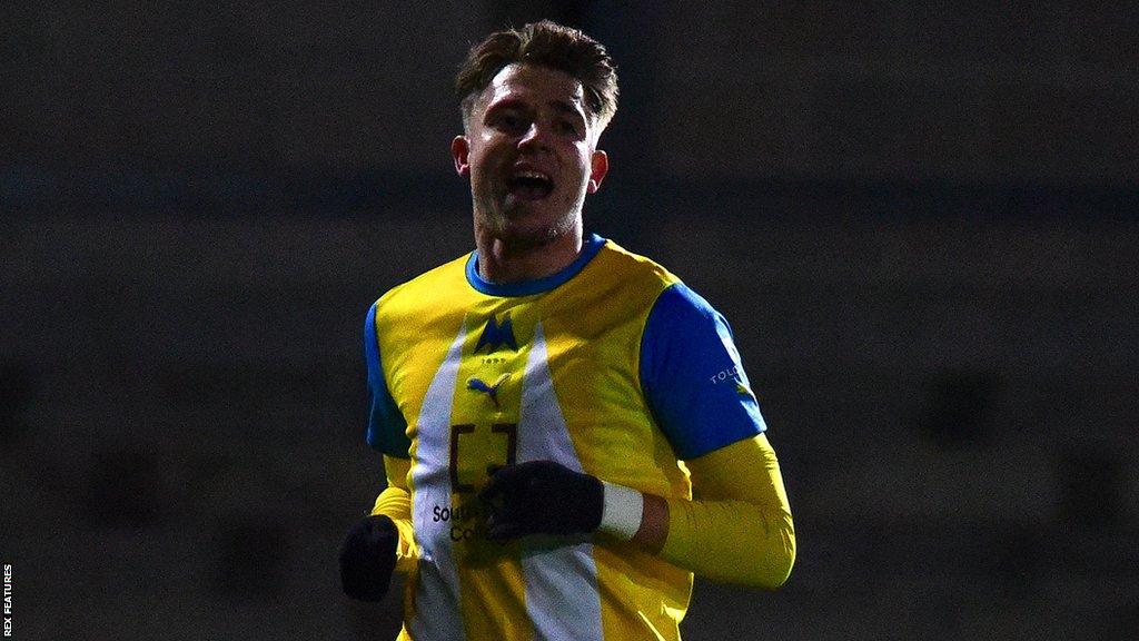 Brad Ash celebrates scoring against Weymouth