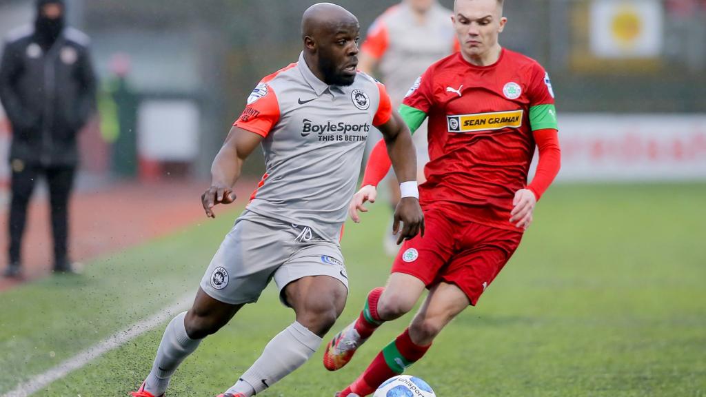 Action from Cliftonville against Larne