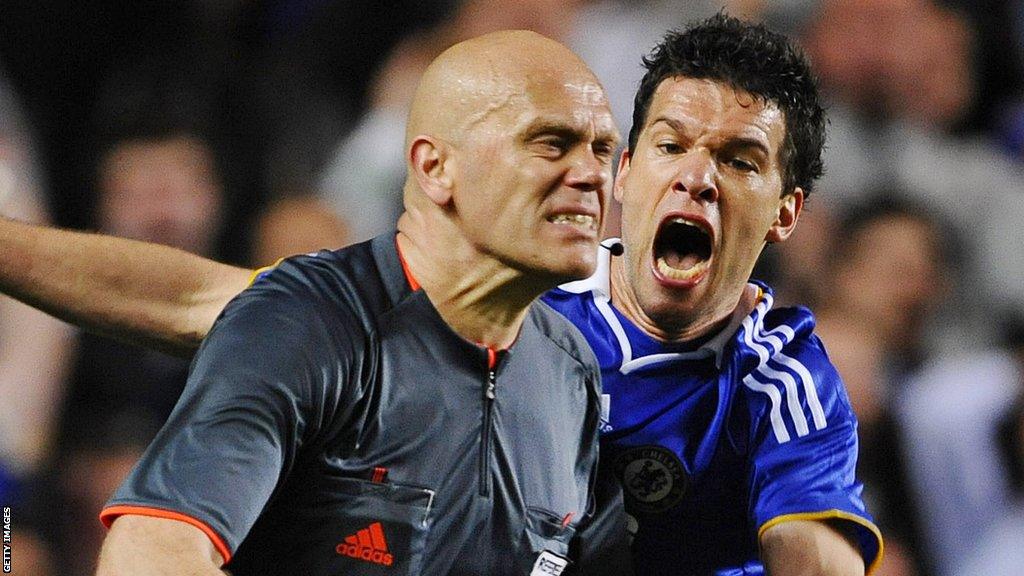 Michael Ballack of Chelsea complains to referee Tom Henning Ovrebo after he turned down a penalty claim in the final minute of the Chelsea v Barcelona Champions League semi-final second leg at Stamford Bridge in May 2009