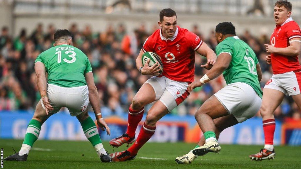 George North runs at Ireland players