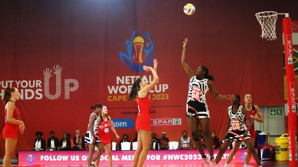 Georgia Rowe of Wales shoots at goal during the Netball World Cup 2023, match against Trinidad and Tobago in Cape Town