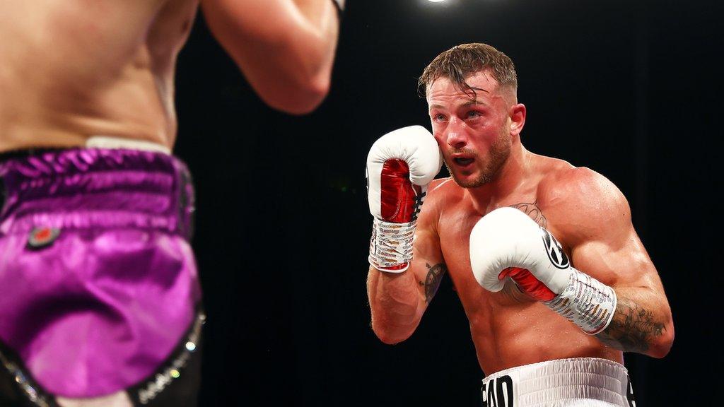 Brad Pauls (right) in action in the ring