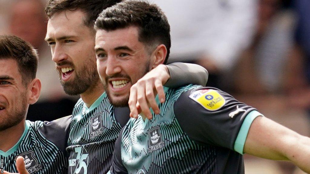 Finn Azaz celebrates scoring Argyle's final goal in their 3-1 win over Port Vale on the final day of last season