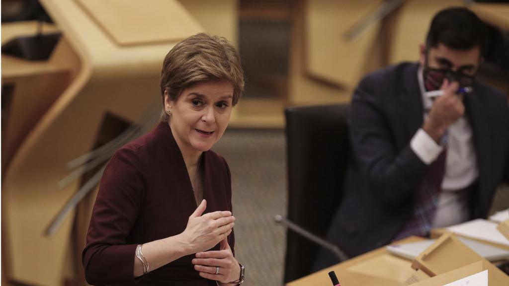 Nicola Sturgeon, Scotland's First Minister, updates MSPs on changes to the Covid-19 restrictions over Christmas following the emergence of the new strain