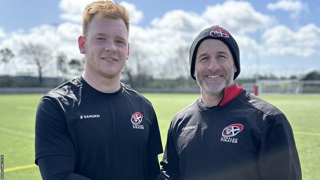 Pirates joint-head coach Gavin Cattle (right) welcomes Iestyn Harris to the club