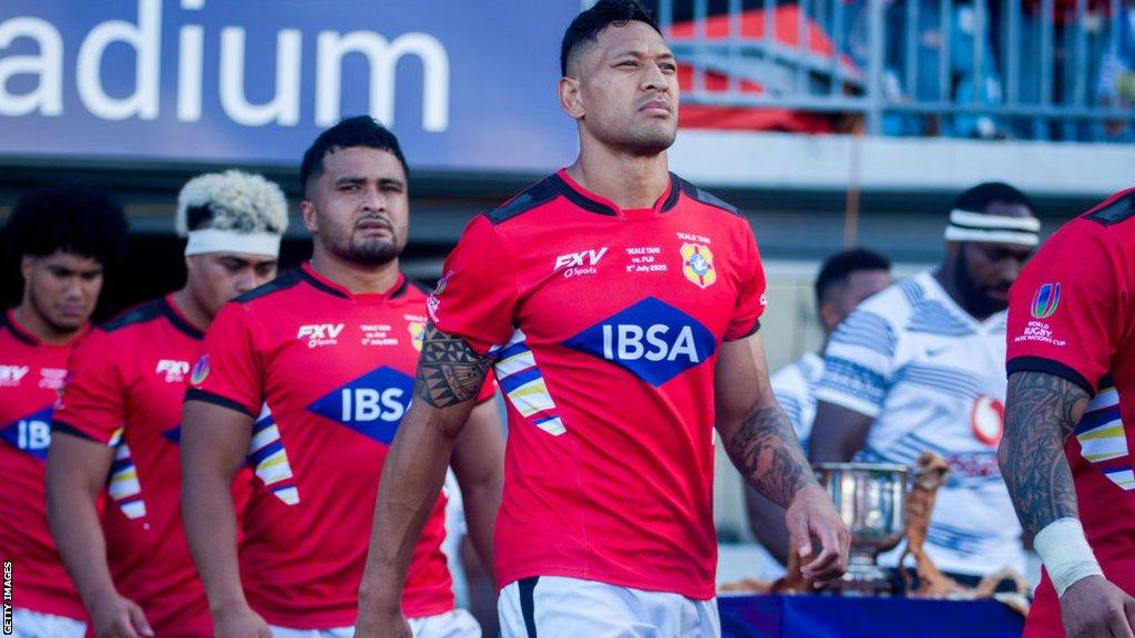 Israel Folau walks on to the field