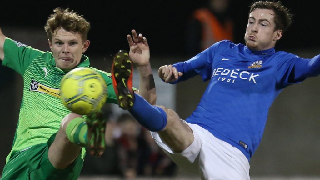 Action from Glenavon against Cliftonville