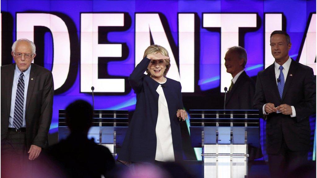 Hillary Clinton looks out from the debate stage