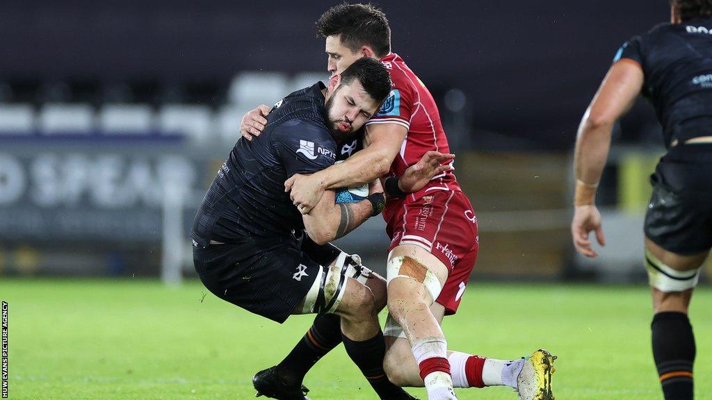 Scarlets flanker Tomas Lezana was shown a red card for a high tackle on Ospreys lock Rhys Davies