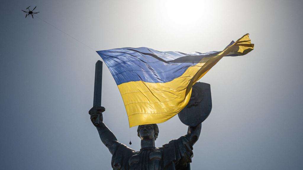 A drone flying a giant Ukrainian flag