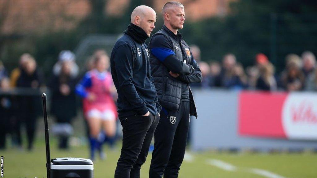 Olli Harder and Paul Konchesky watching West Ham play