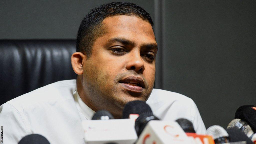 Sri Lanka sports minister Harin Fernando speaking at a news conference