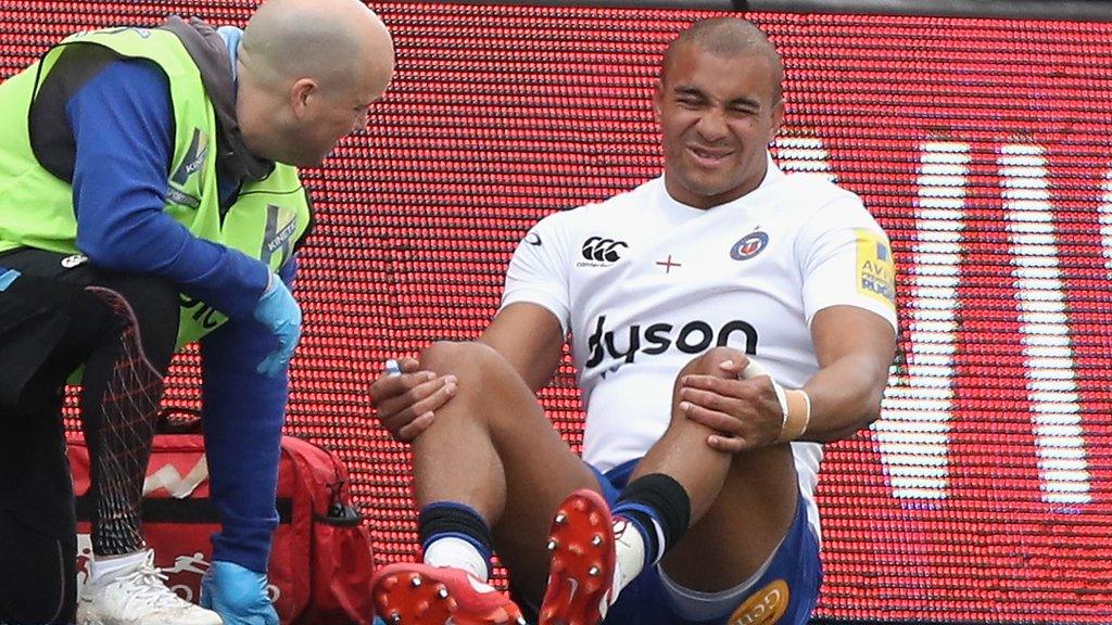 Jonathan Joseph lies injured at Saracens