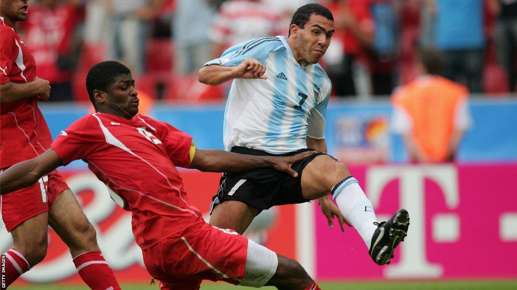 Radhi Jaidi (left) and Carlos Tevez