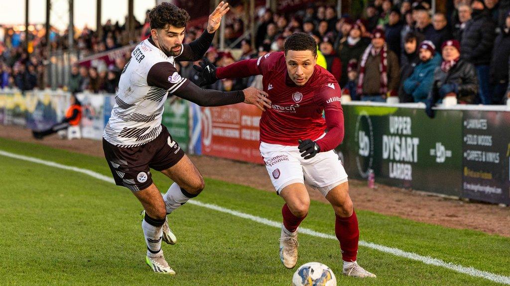 Ayr's Nick McAllister and Arbroath's Leighton McIntosh